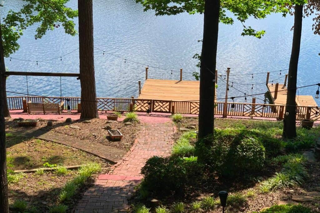 a lake with a wooden dock