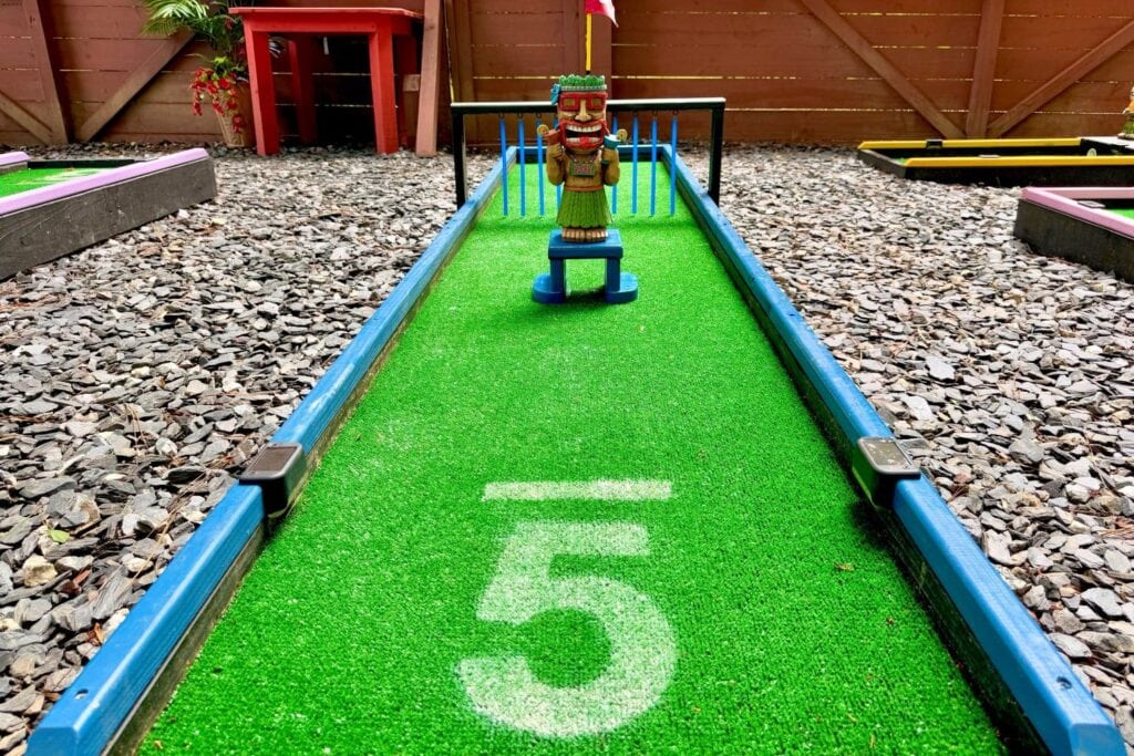 tiki-themed mini golf lane
