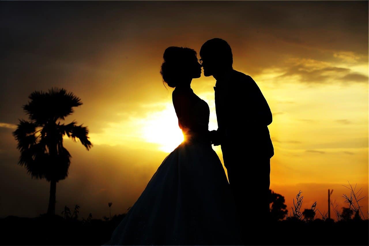 bride and groom sunset