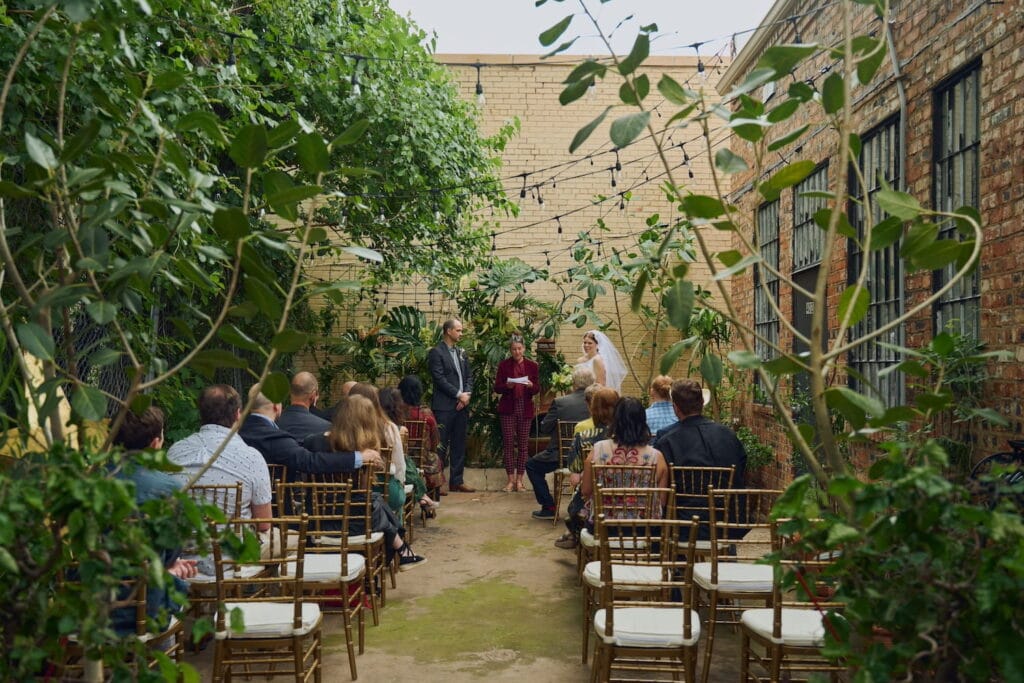 Small wedding ceremony in a courtyard in Dallas
