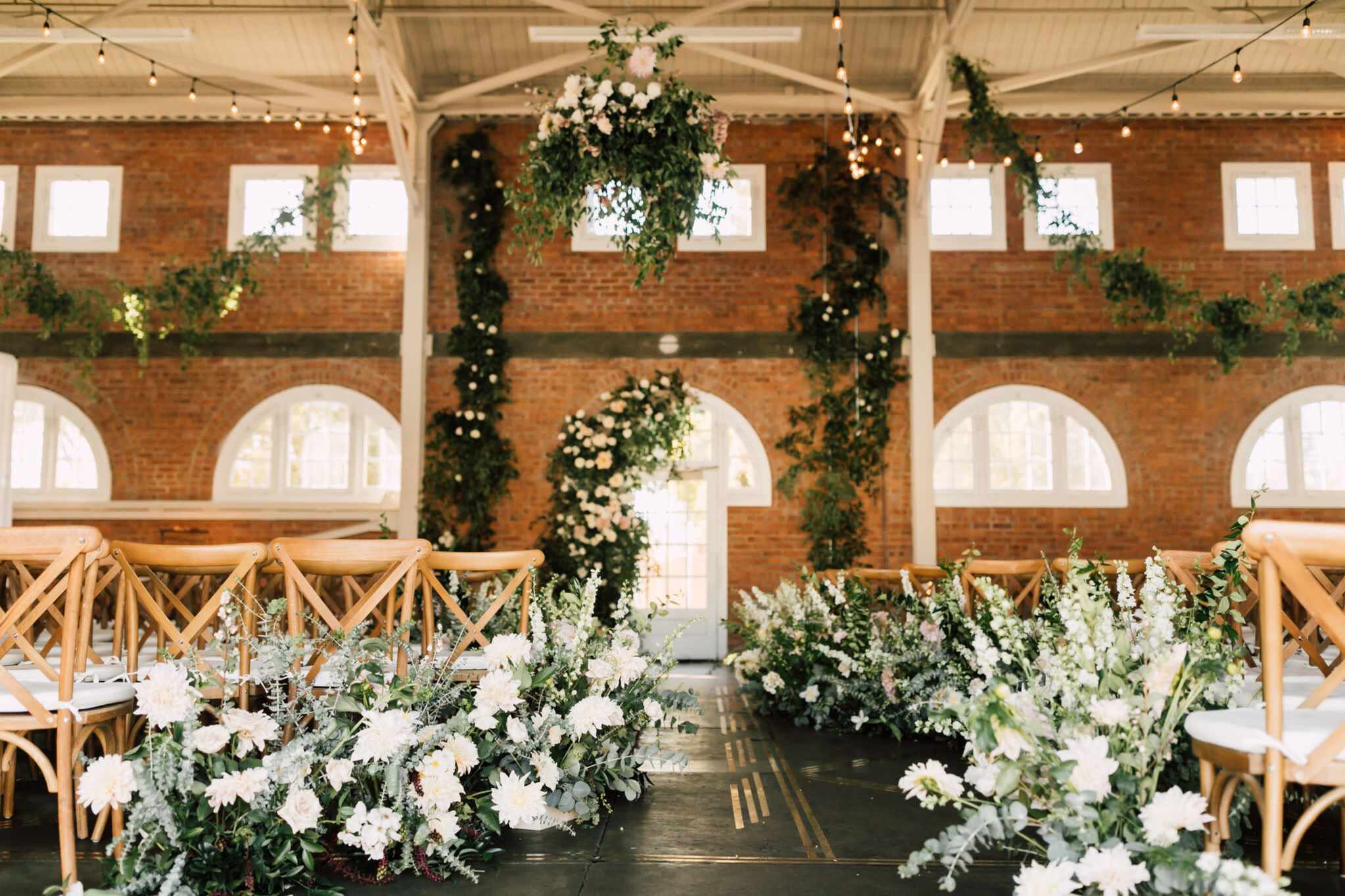 Finished wedding floral installation inside an Austin venue space