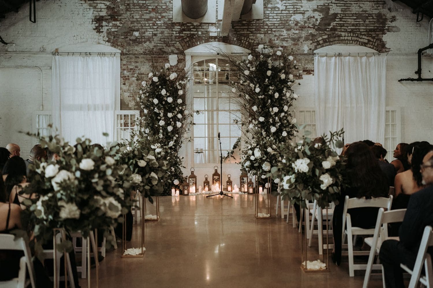 Romantic wedding floral design at a Brooklyn event space venue