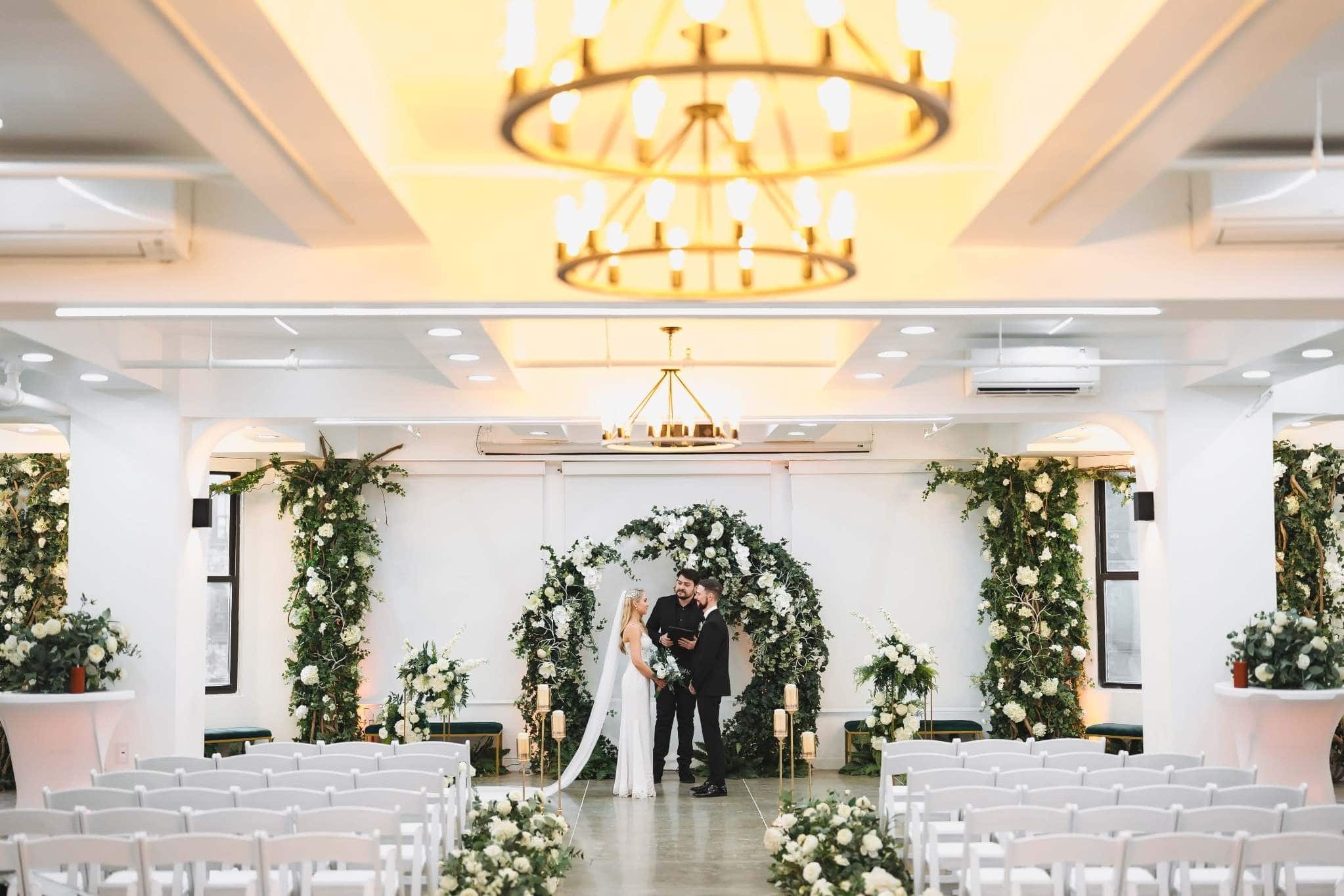 Seasonal Chicago wedding florals for a ceremony arch