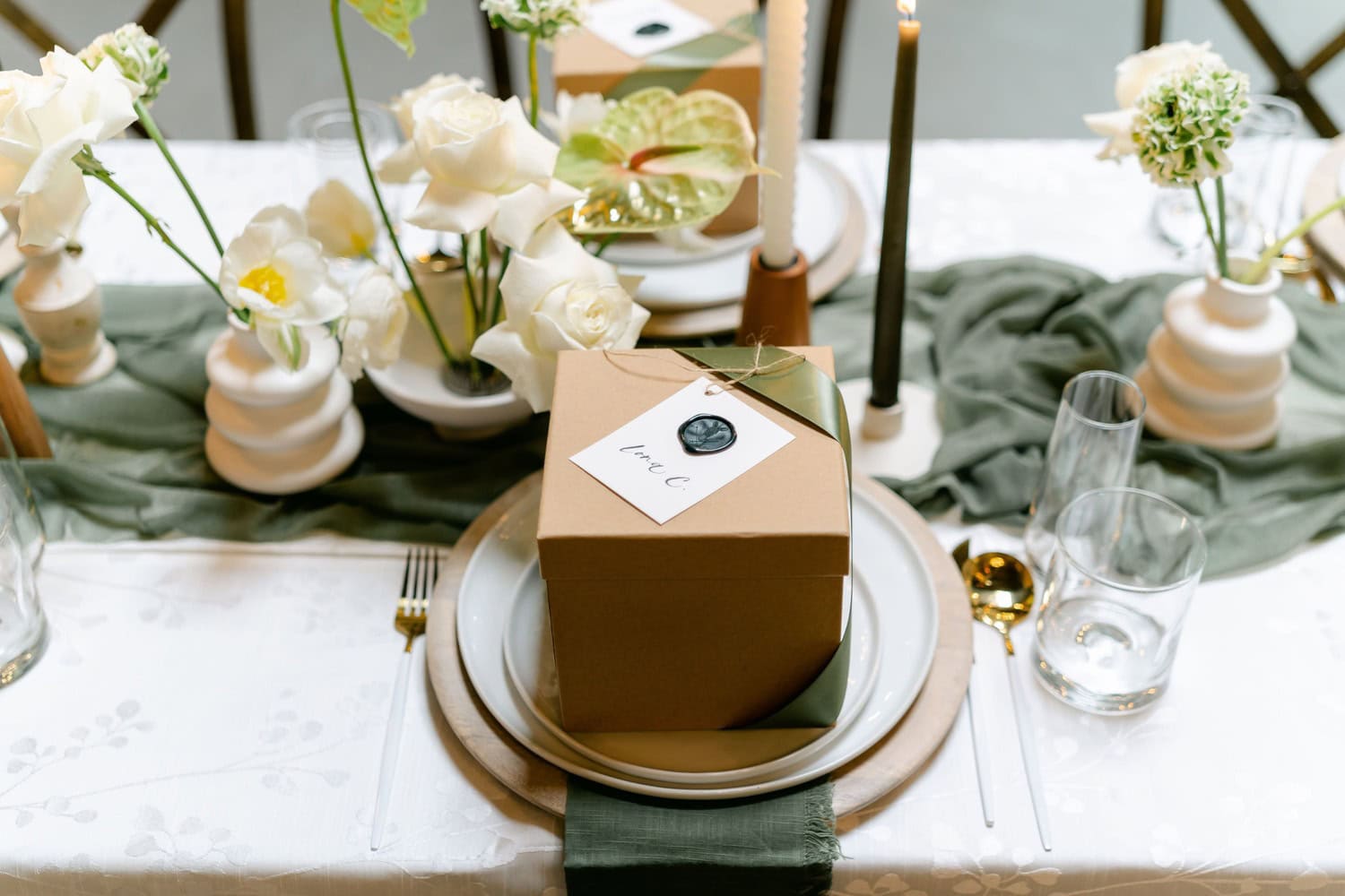 Wedding florals arranged by Cleveland florists for a reception table