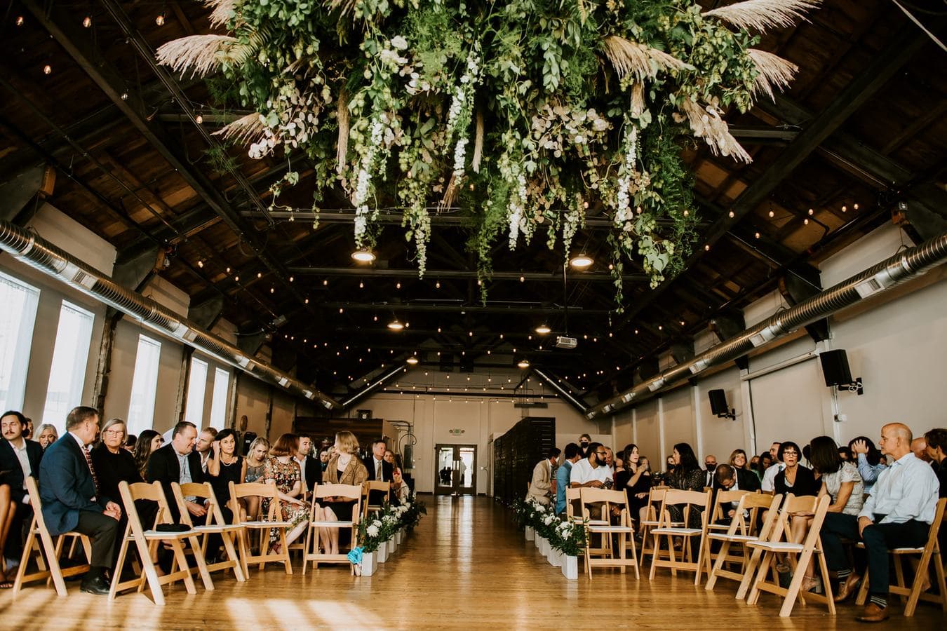 Wedding flowers in Raleigh designed for a ceremony and reception