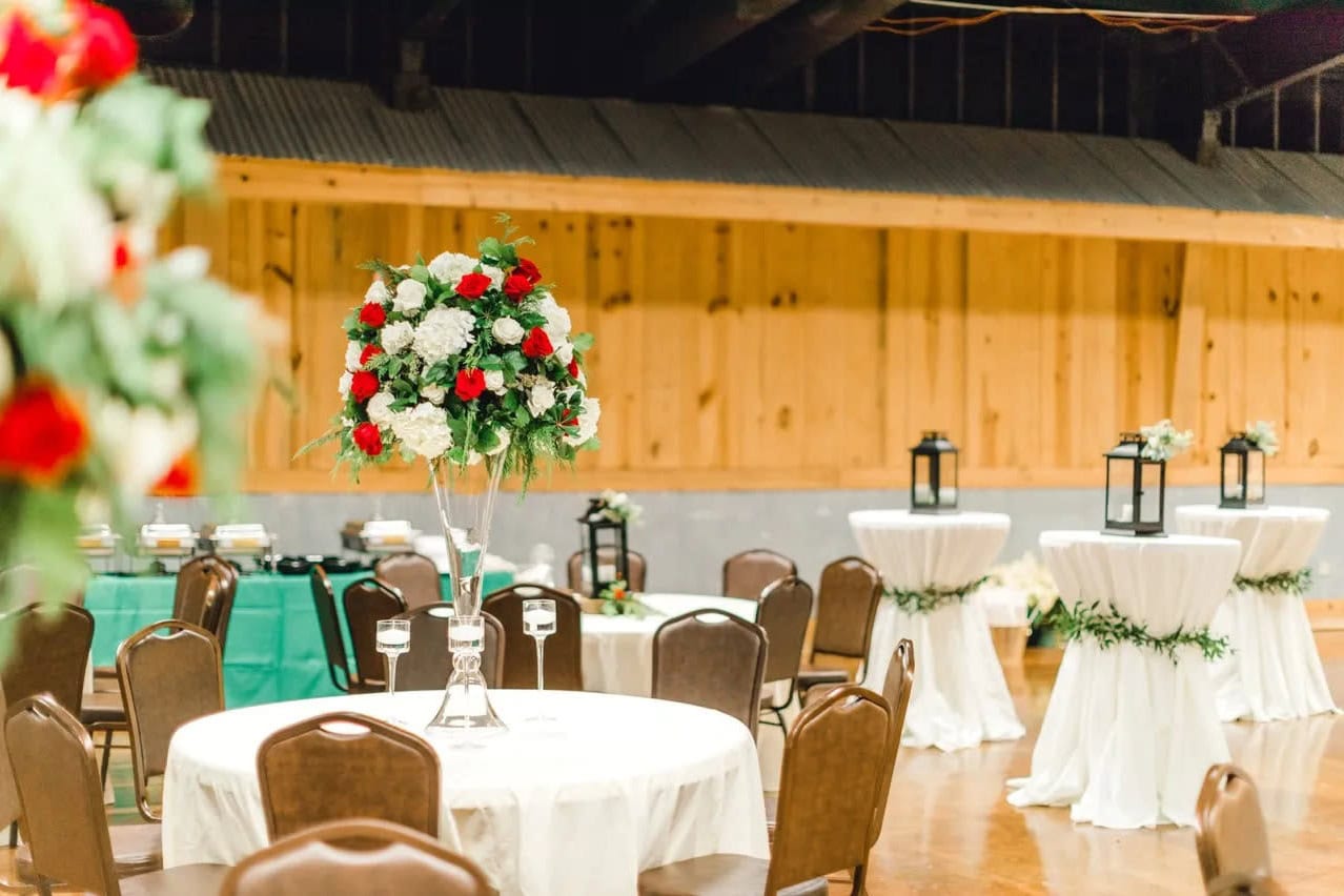 Alabama event space with floral centerpieces and polished reception styling