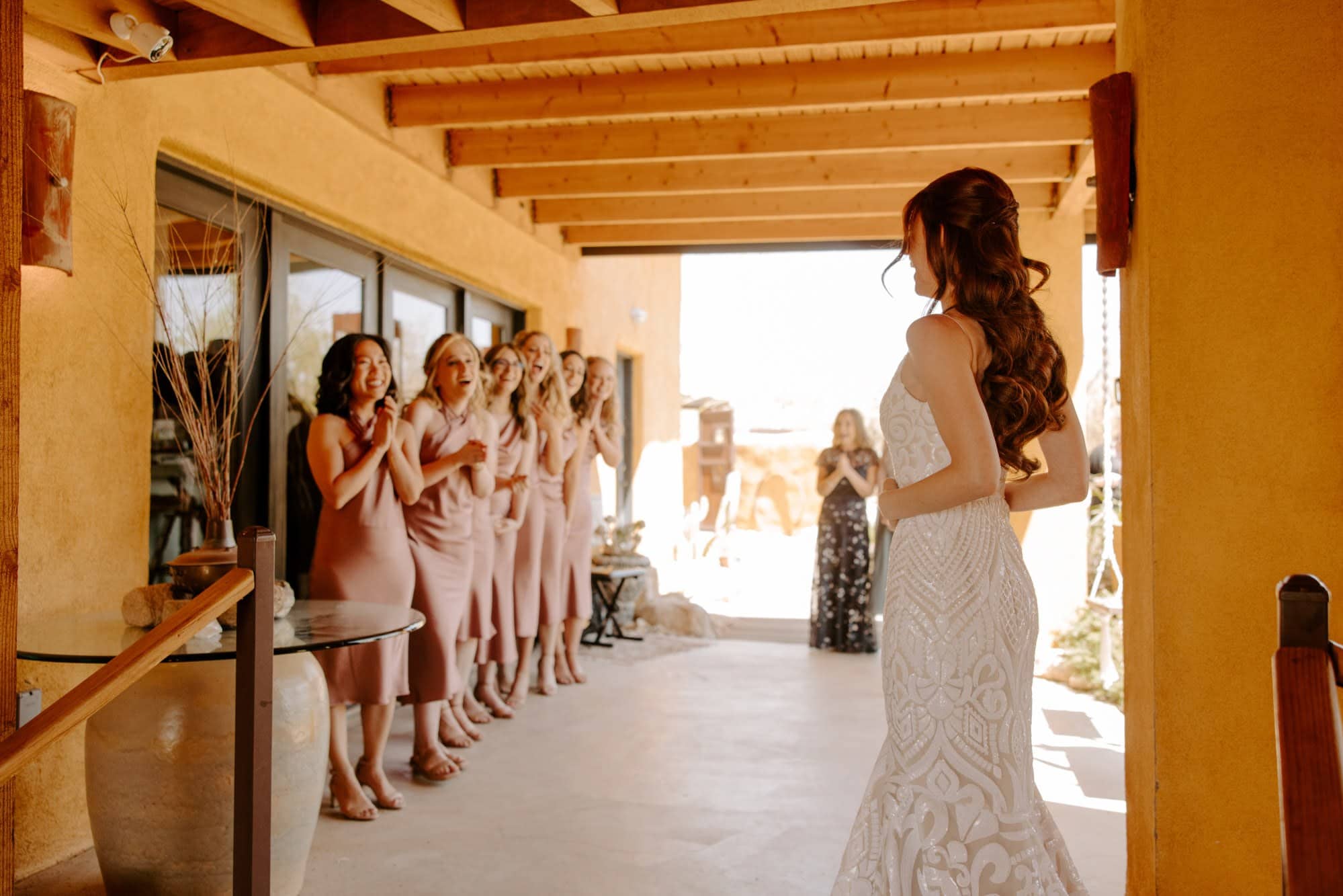 Bride and bridesmaids getting ready in a rustic Albuquerque wedding venue