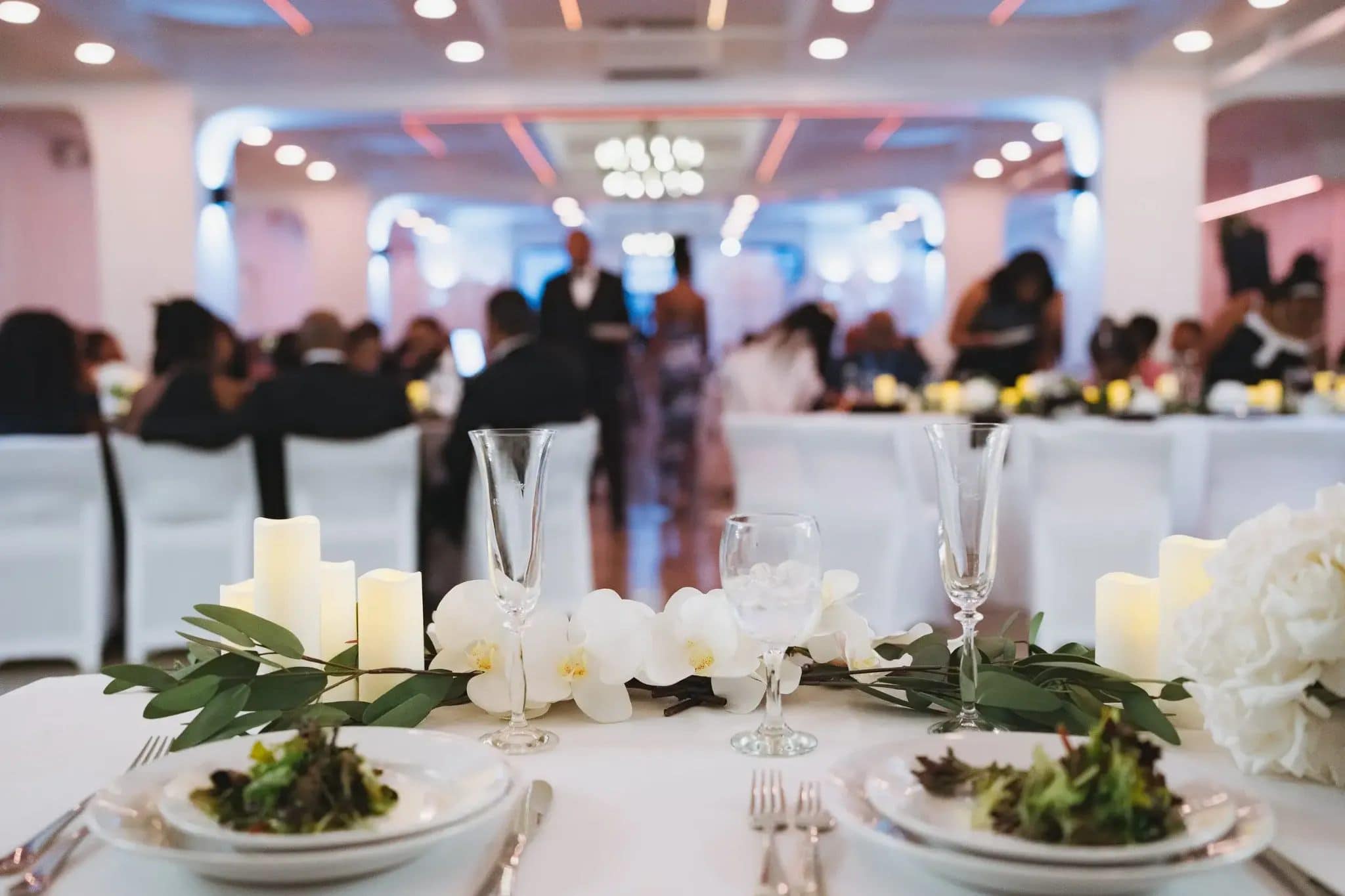 Brooklyn wedding reception tablescape with orchid centerpiece and formal settings