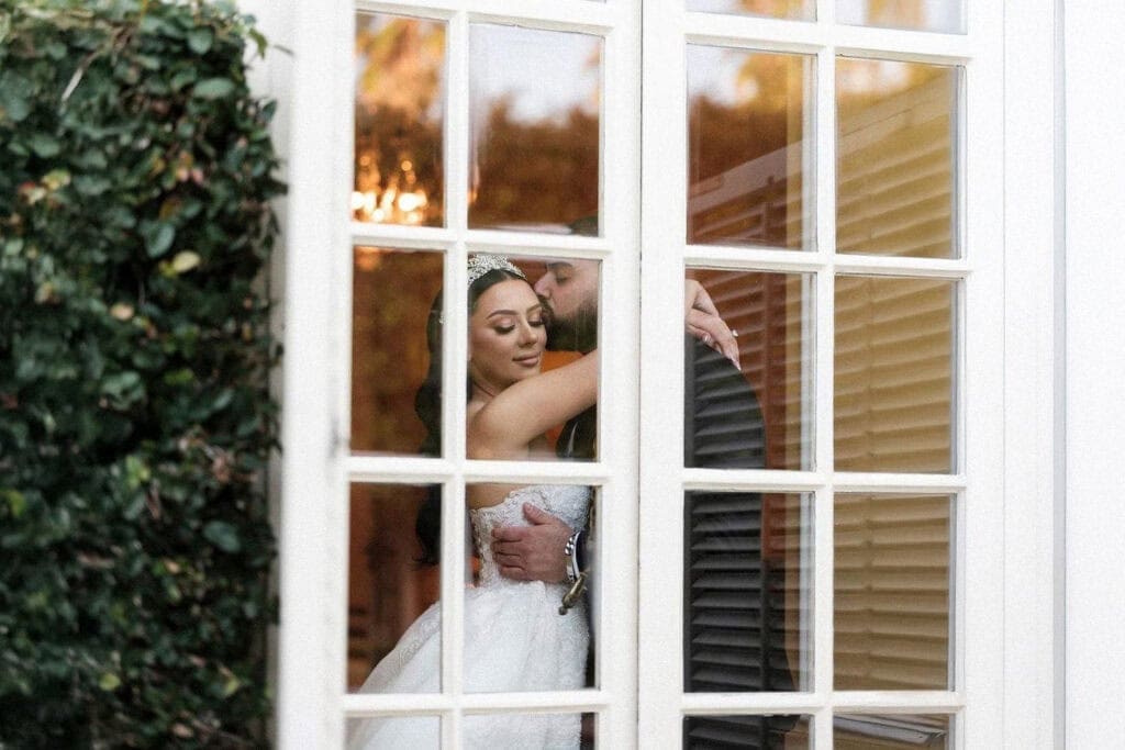 Romantic couple sharing an intimate moment at a Cleveland wedding venue