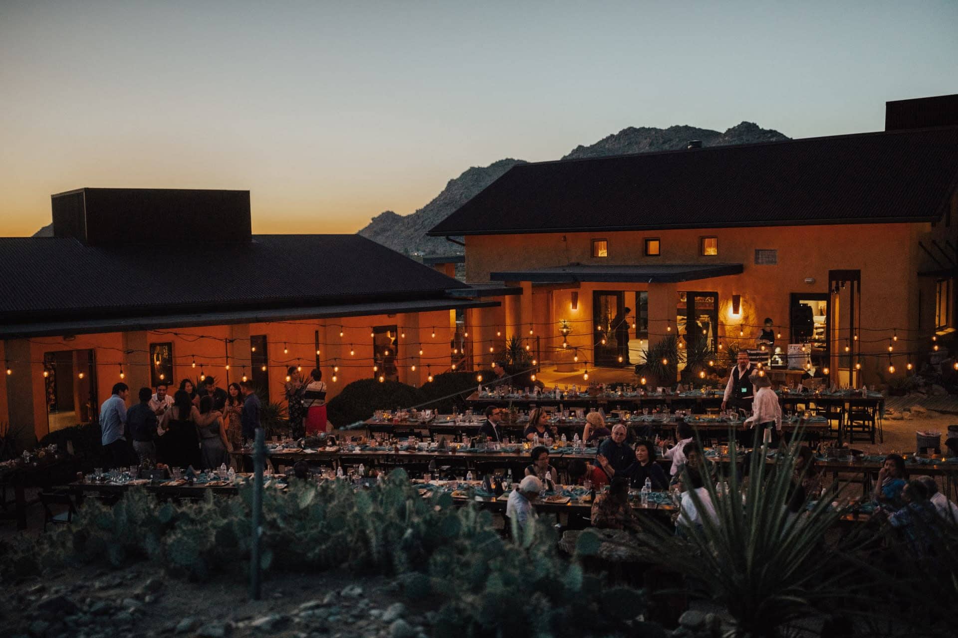 Wedding reception styled by top El Paso wedding planners with floral centerpieces