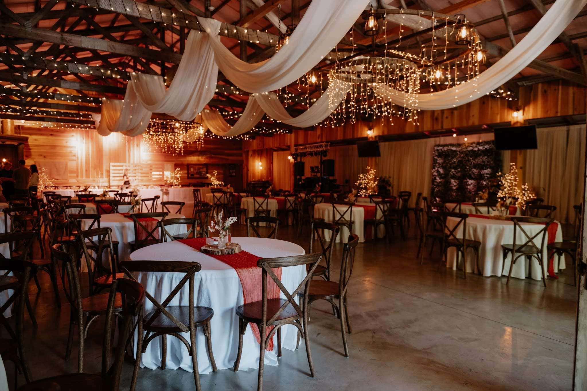 Upscale Louisiana wedding venue with string lights and decor