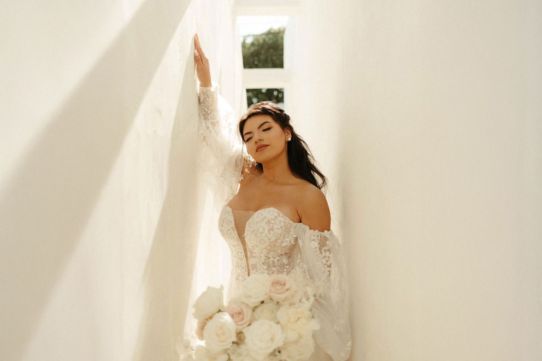 Bride posing in a modern, minimalist venue designed by Maryland event planners