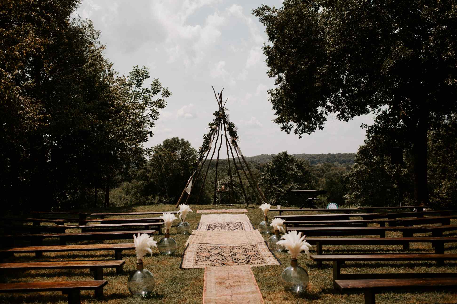 Styled teepee altar with florals for Mississippi wedding ceremony