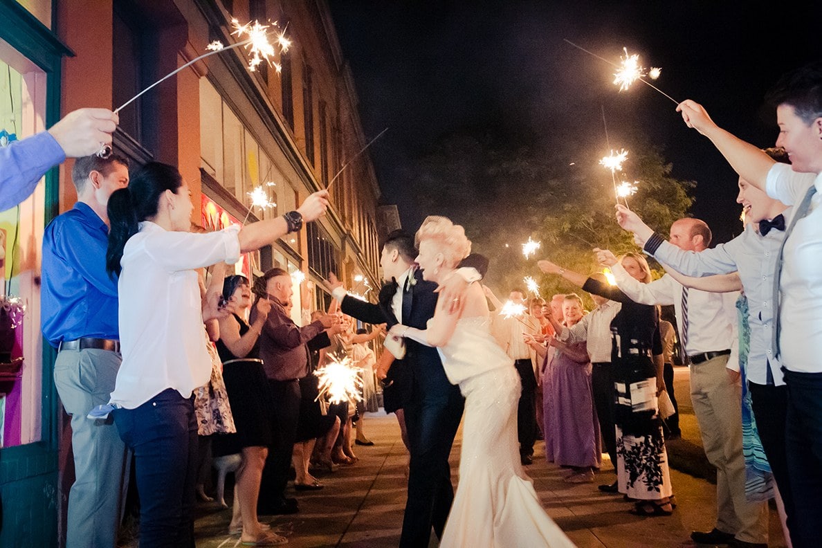 Montana wedding sparkler exit with bride, groom, and guests