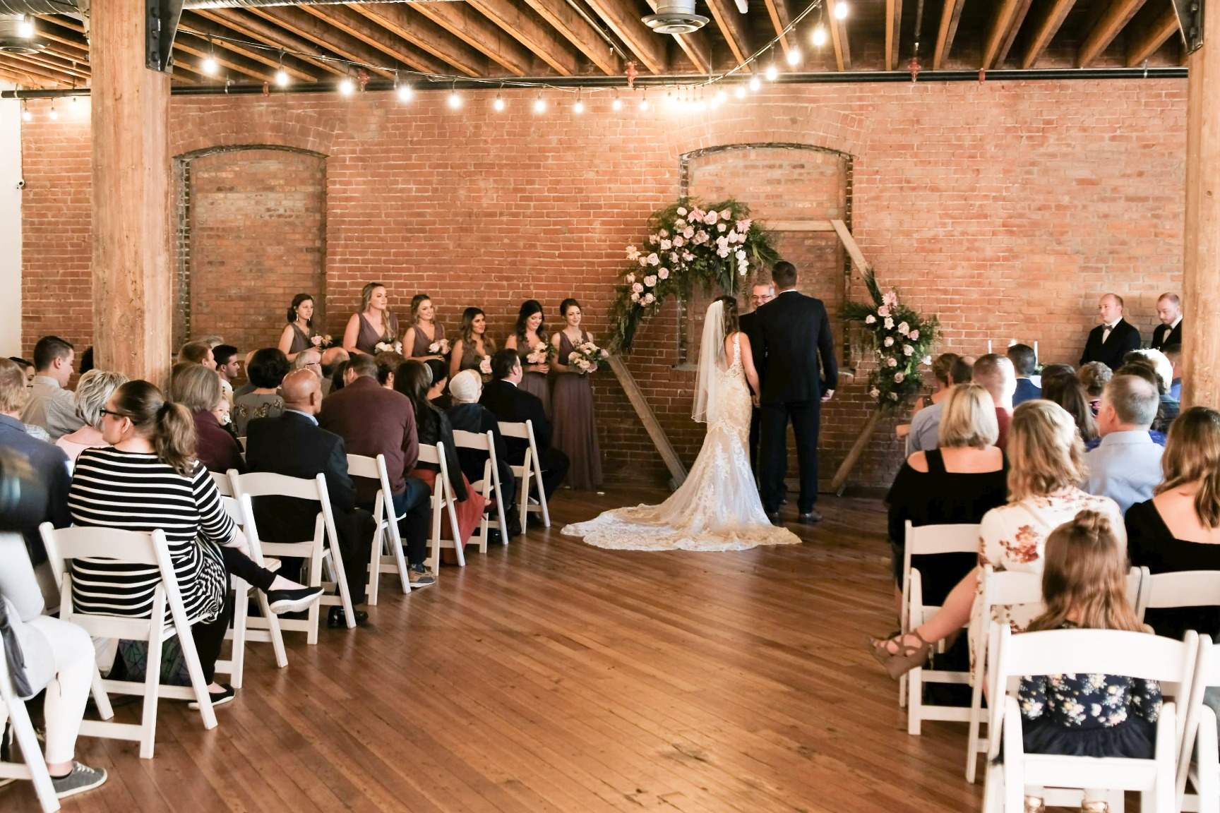 Wedding planner reviewing details for a Nebraska ceremony and reception setup