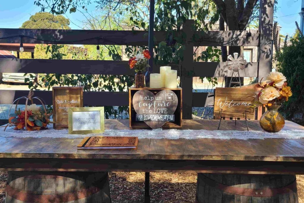 Rustic outdoor guestbook table styled by Raleigh wedding planners