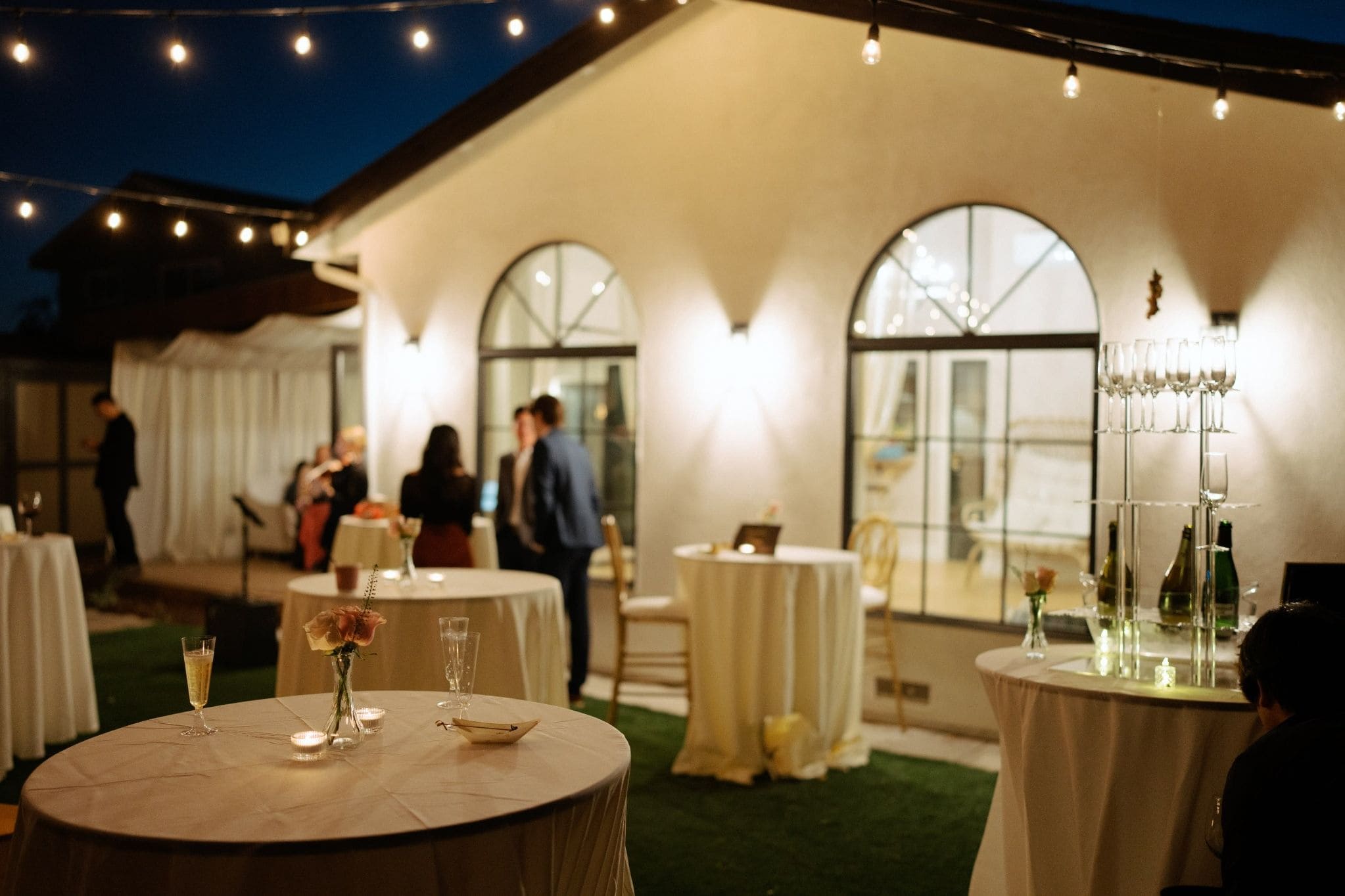 Evening cocktail reception with ambient lighting at San Jose wedding venue