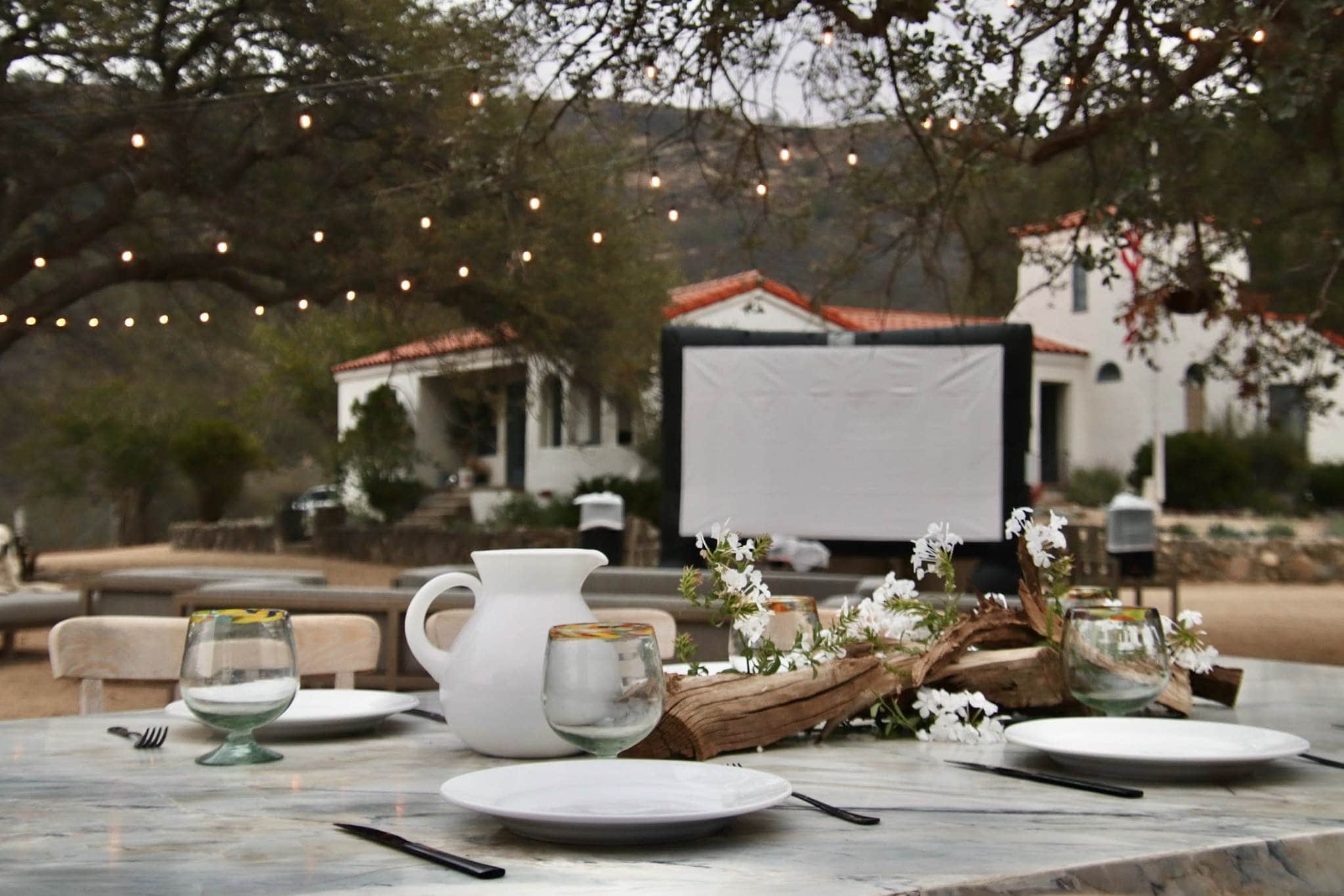 Elegant outdoor dining setup with string lights for a Scottsdale wedding reception