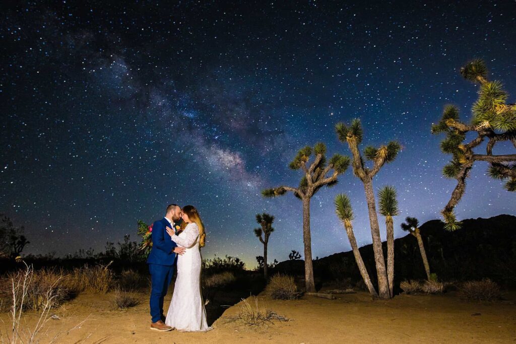 Bride and groom under starry night sky at Utah outdoor wedding