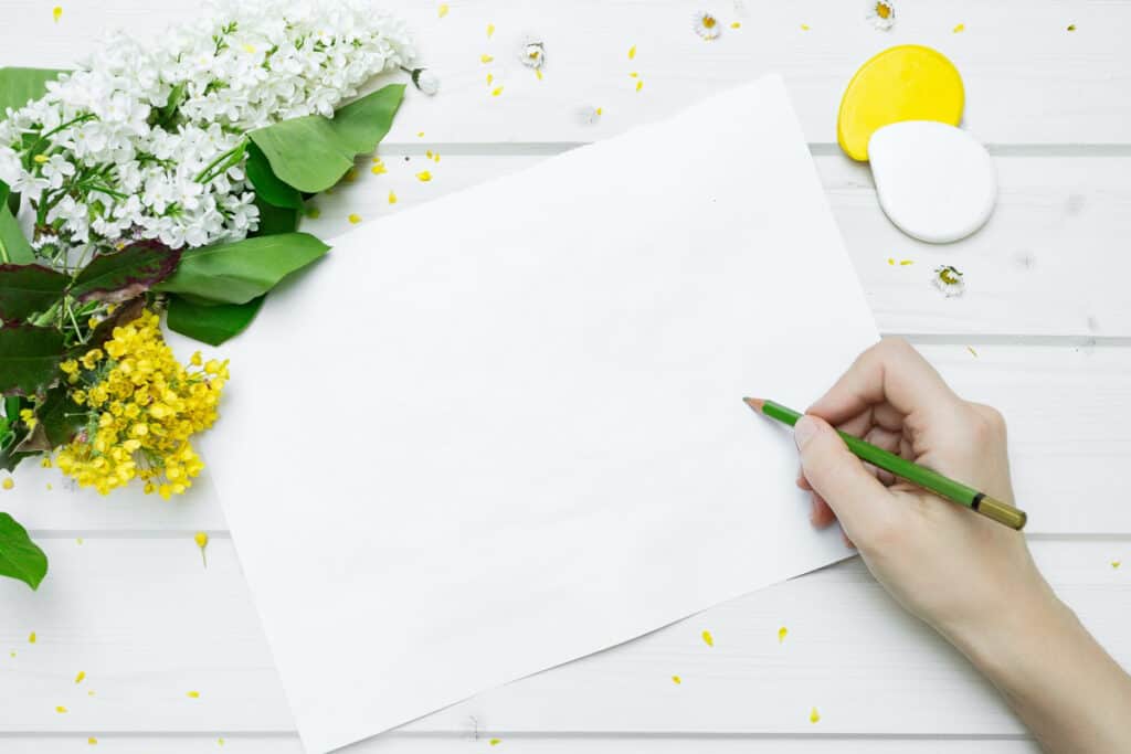 a person writing a handwritten note