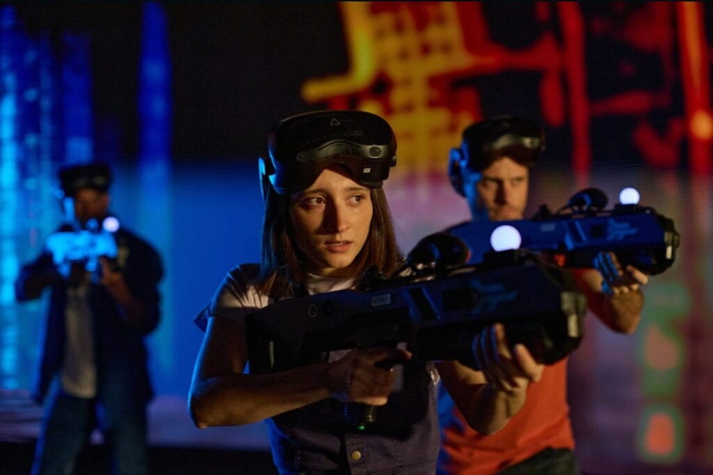 Two people participate in a VR game