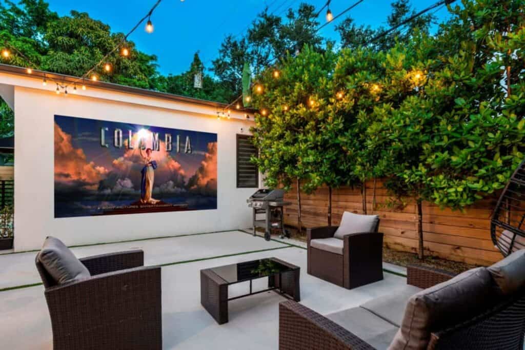 back garden with chairs and projector screen