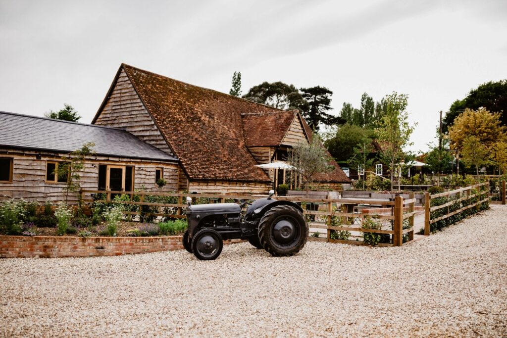 barn and tractor at a Rustic Hampshire Farm Venue
