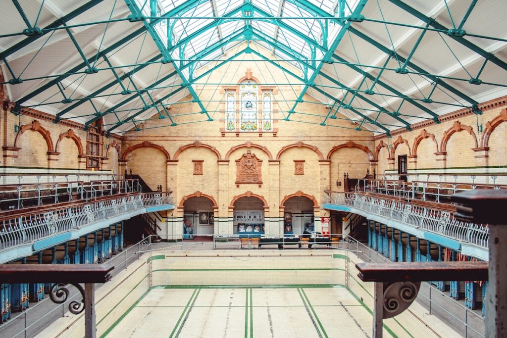 Tiled Edwardian pool hall at Victoria Baths, one of Manchester's most unique hidden gems