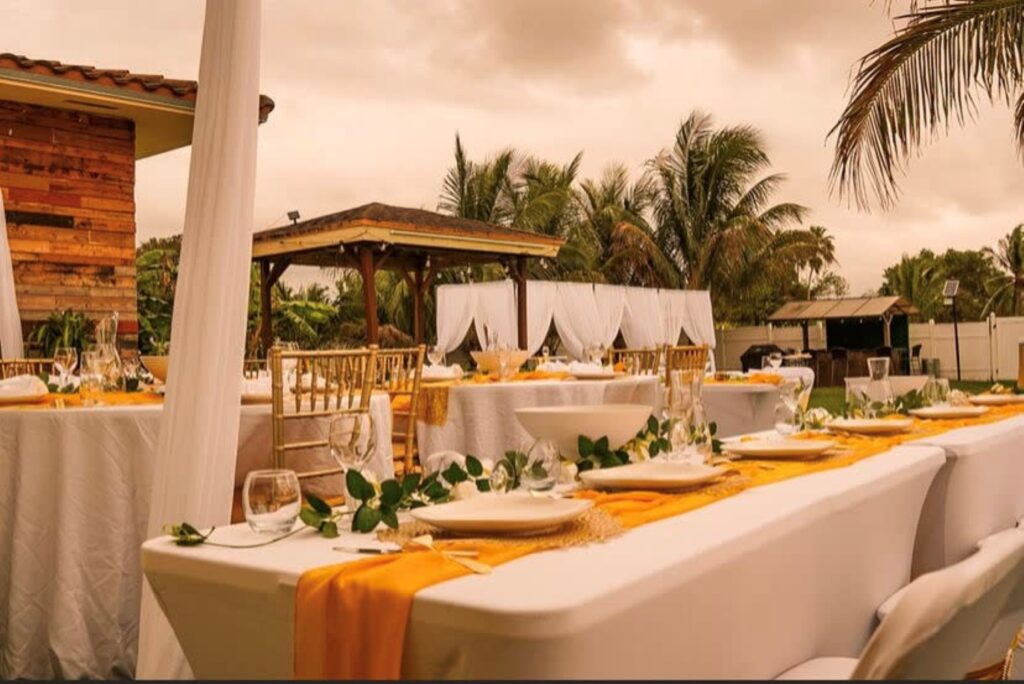 outdoor tablescape with gold and yellow accents