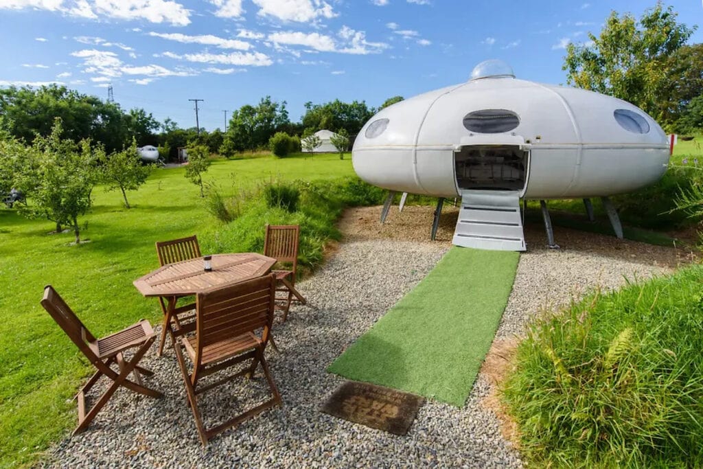 Futuro-style UFO glamping pod at Apple Camping in Pembrokeshire, Wales