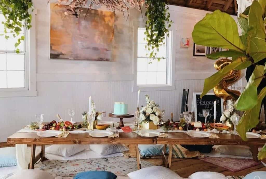 rustic tablescape with cake and flowers