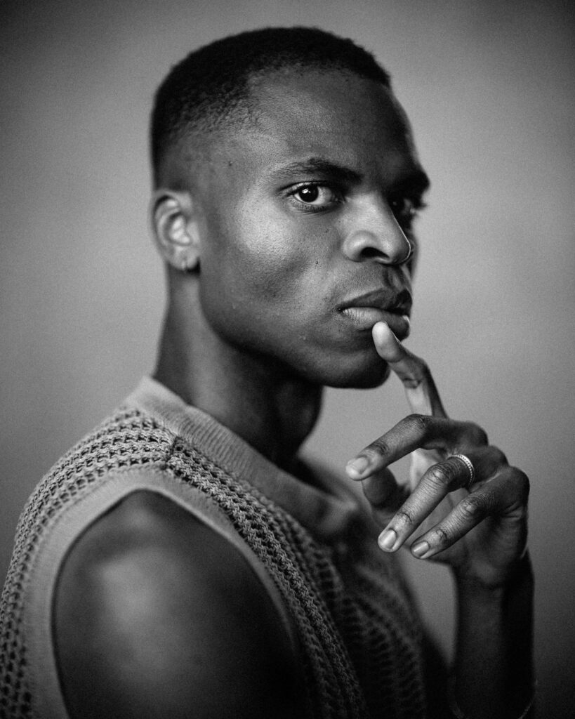 Black and white actor headshot by Tom Trevatt