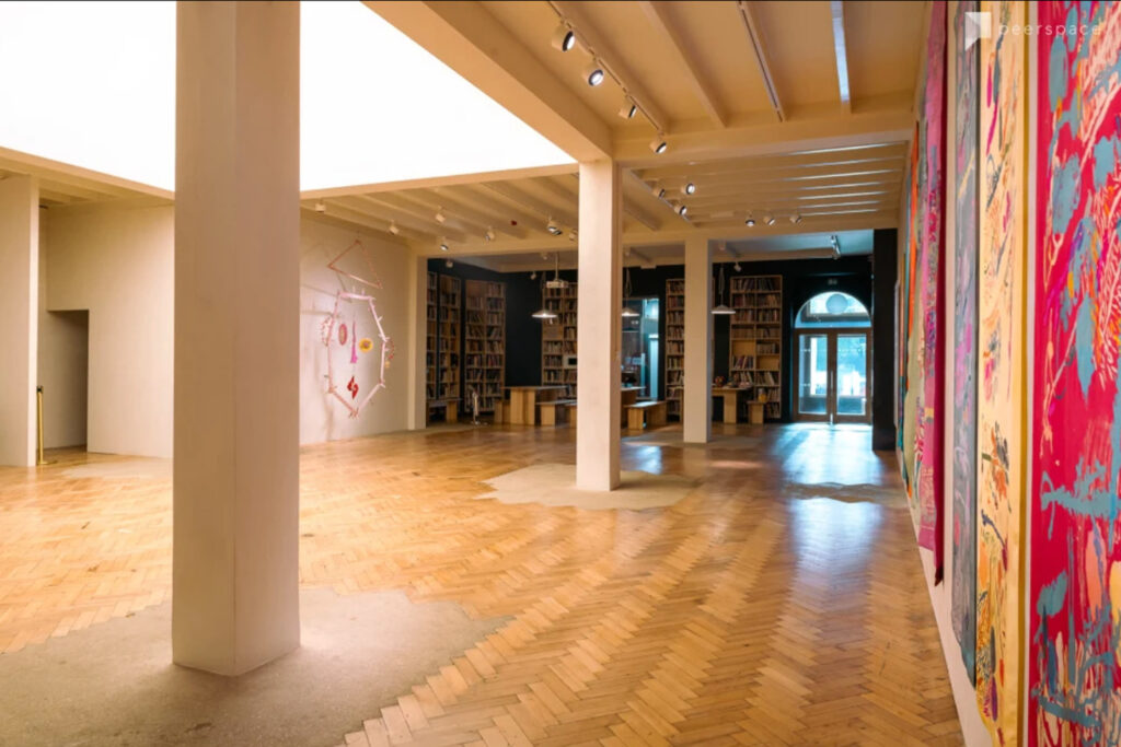 Church converted into an art gallery with a library