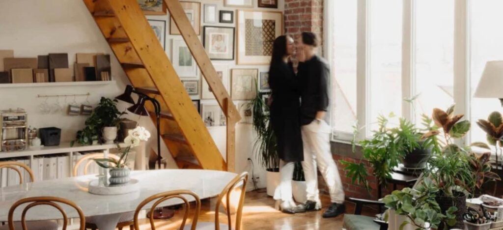 couple kissing in soft focus in a loft venue