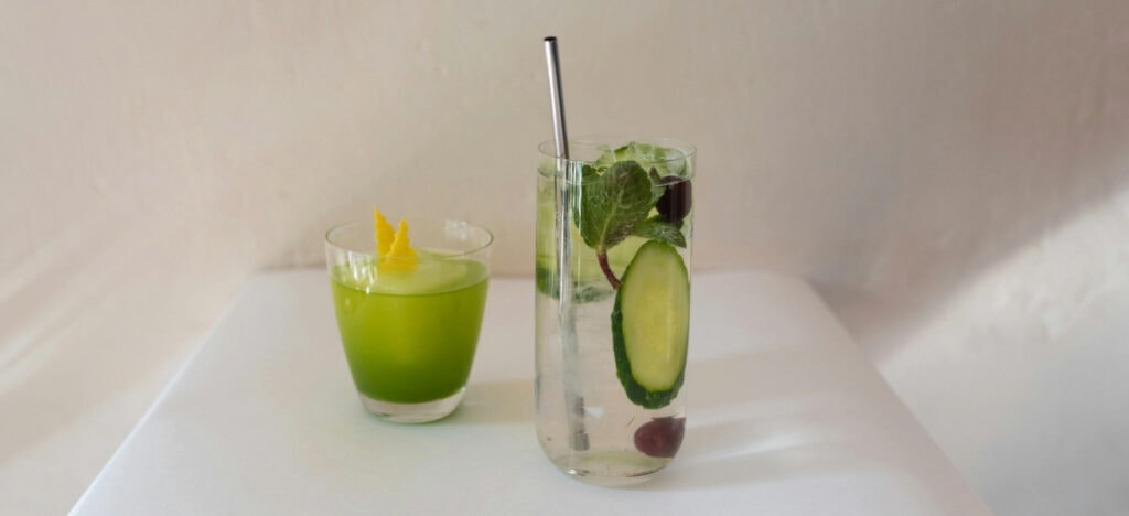 cucumber cocktails on a white table