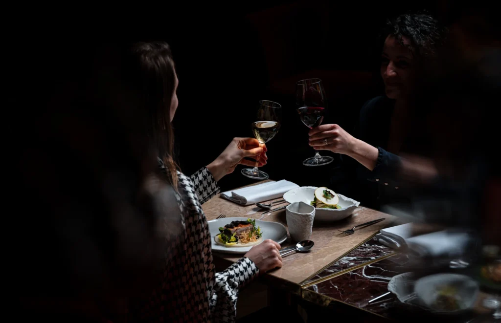 two people eating in pitch black: the Dans le Noir? experience in London