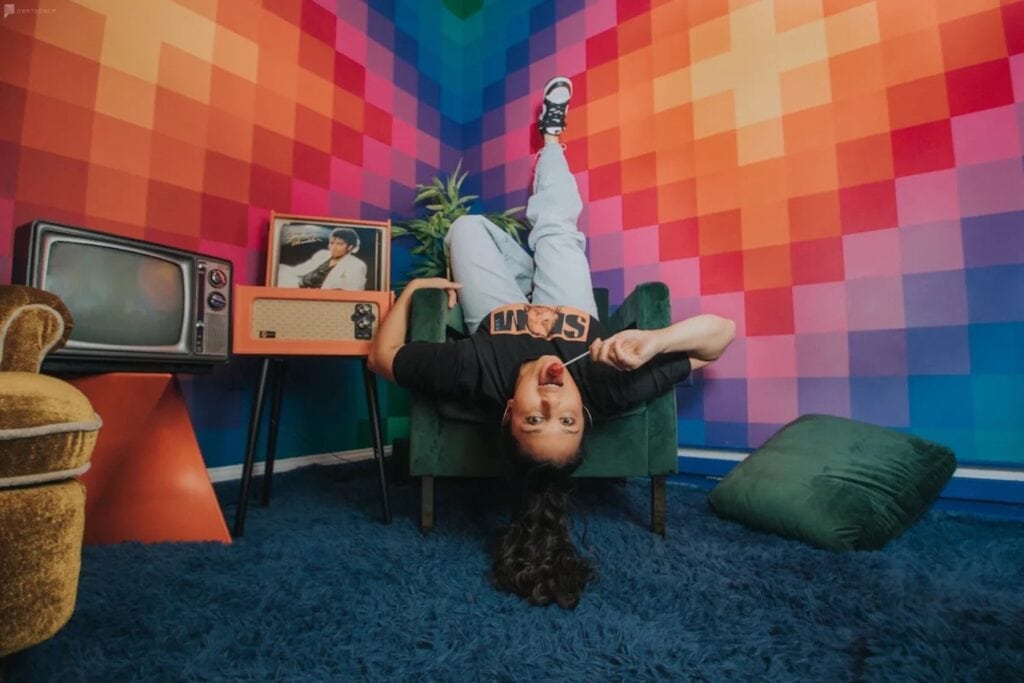 girl on chair with retro decor