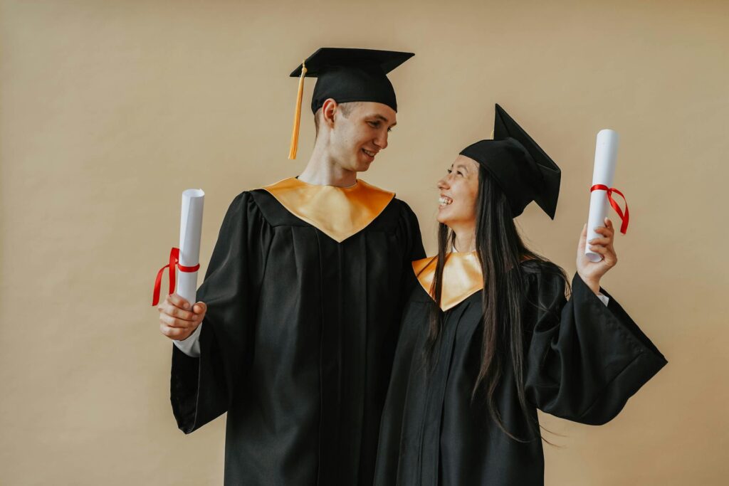 graduates holding certifcates