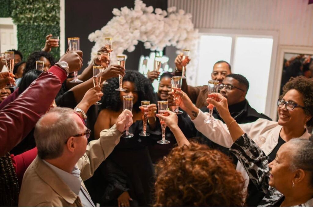 A group of people toasting with champagne during a party
