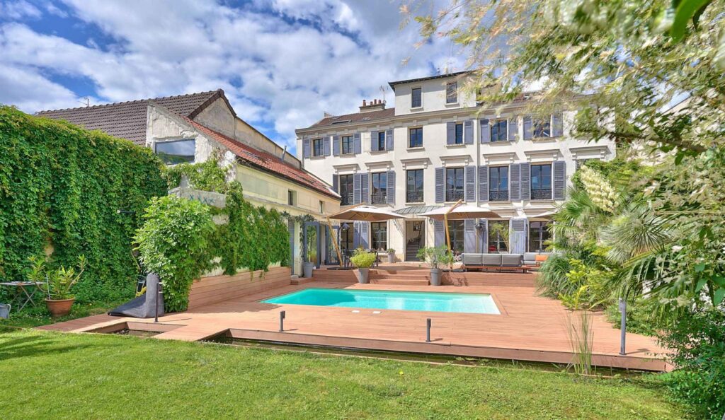 large house with outdoor pool in London