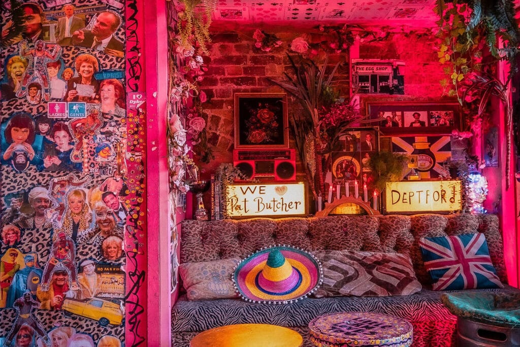 Kitsch cocktail bar under railway arches with teapots and leopard print