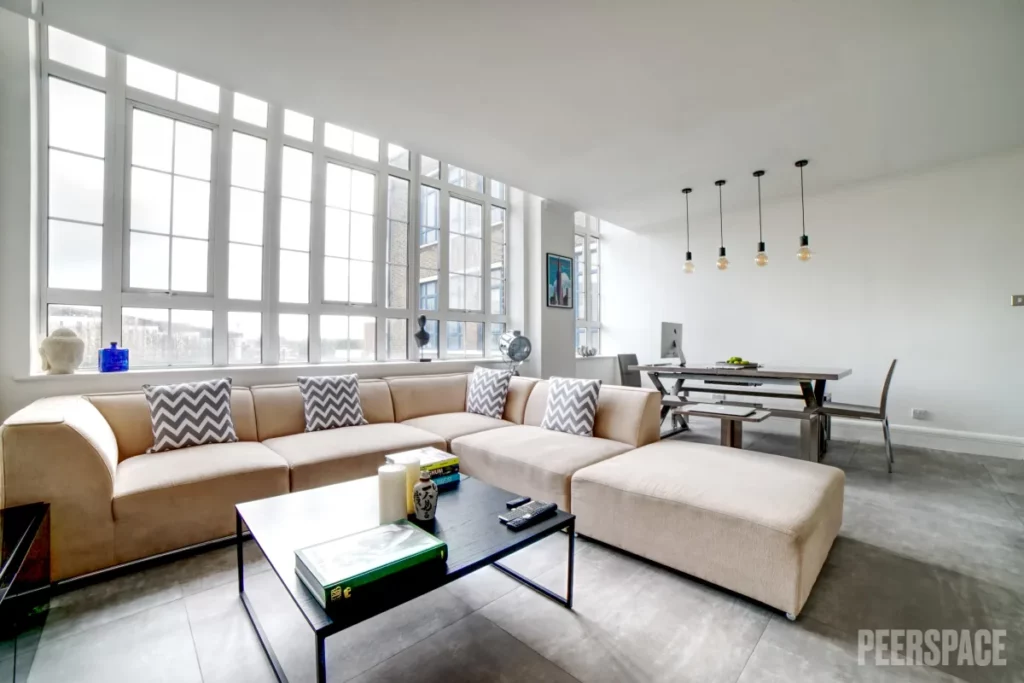 Modern New York loft-style apartment conference seating and lounge