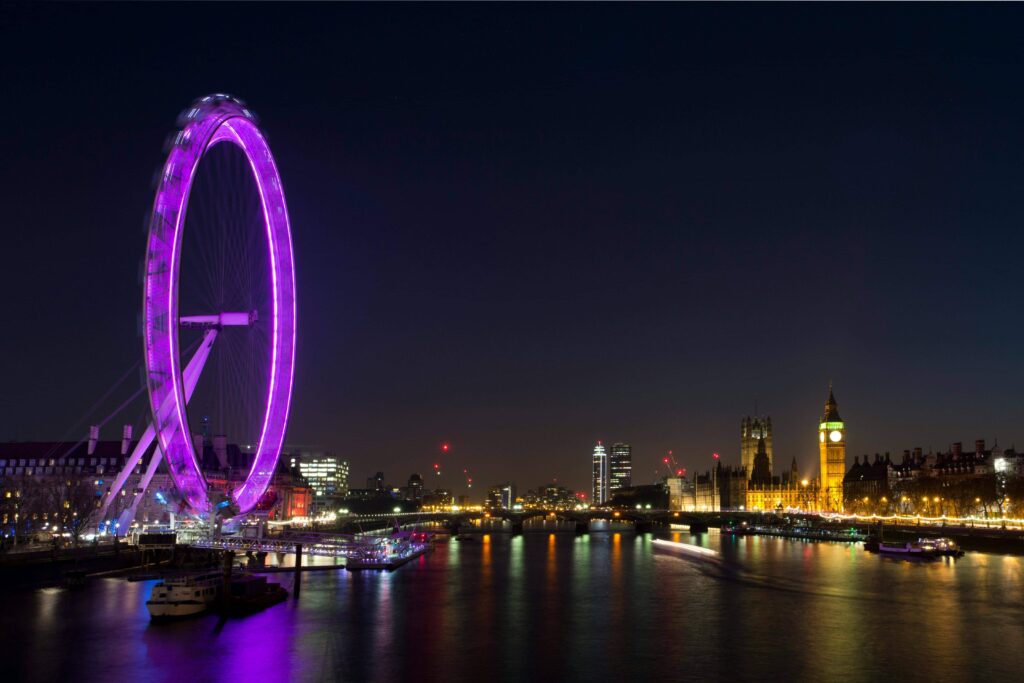 View of London and Thames River illuminated at night