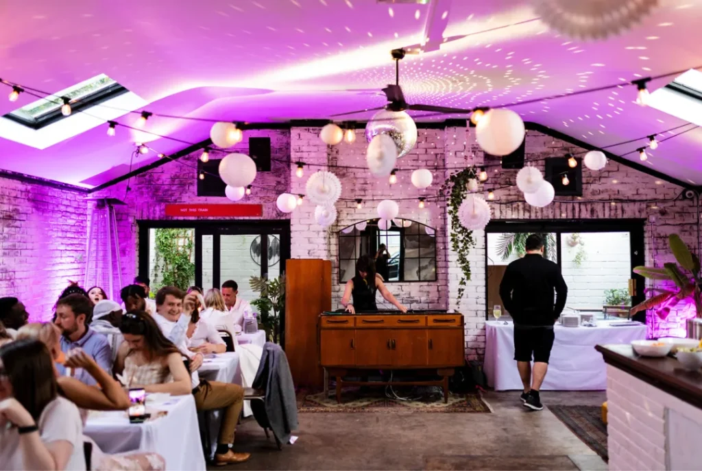 Private event venue with DJ and discoball in Tottenham, London