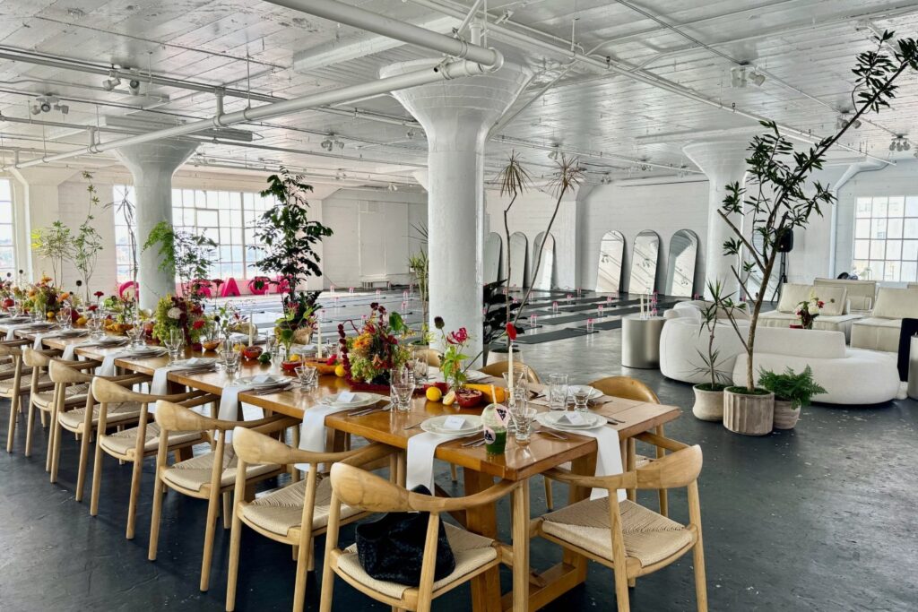 large loft area with dinner with tablescape