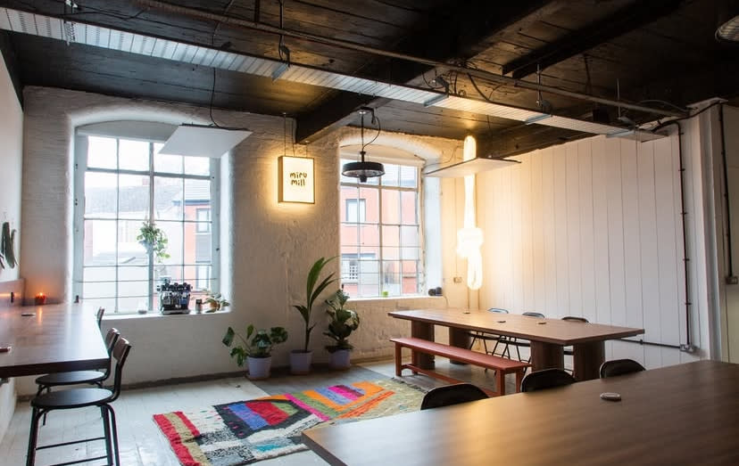 Bright loft-style event space at Miru Mill, a restored Manchester mill