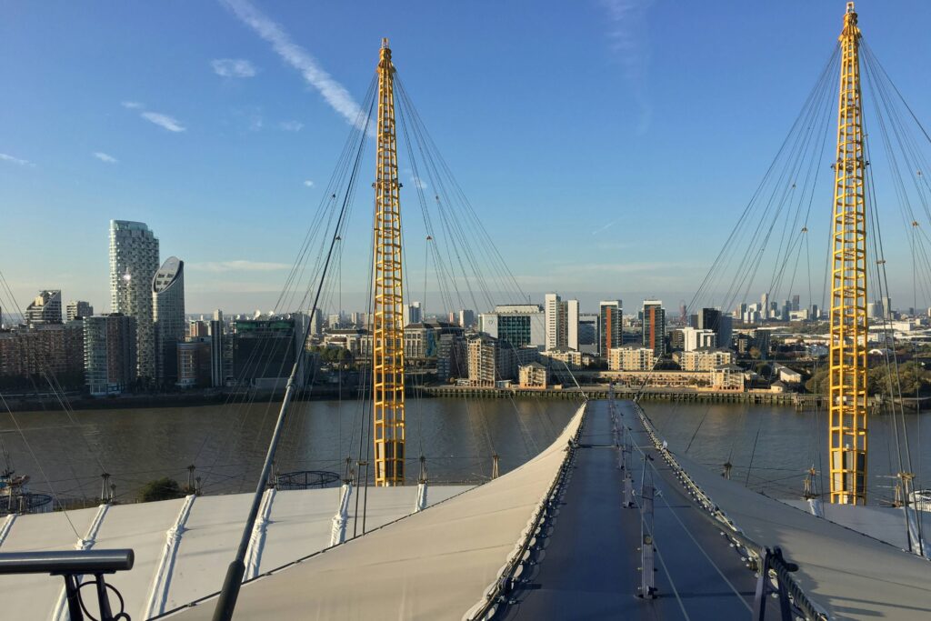 A view from the roof of the o2 in London on a sunny day to the other side of the Thames.