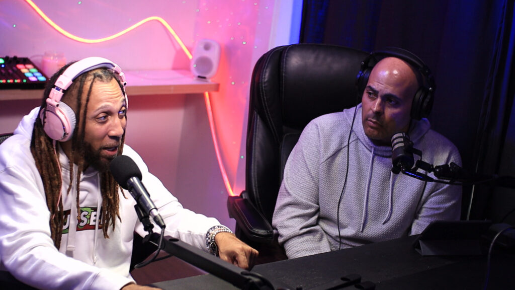 Two music producers in a recording studio