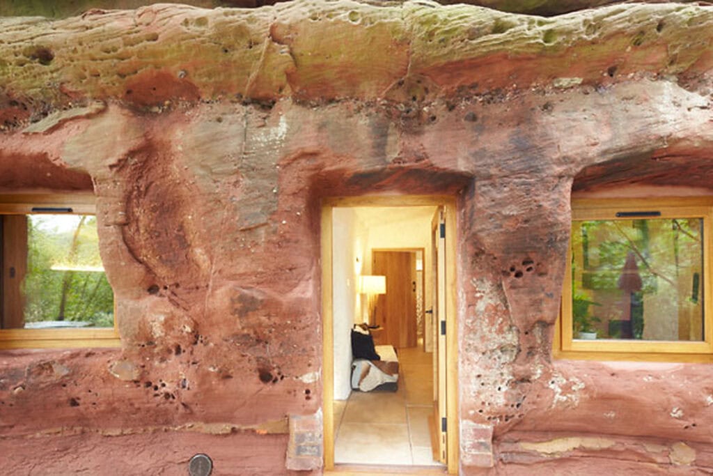 Cave house carved into a sandstone cliff at The Rockhouse Retreat in Worcestershire