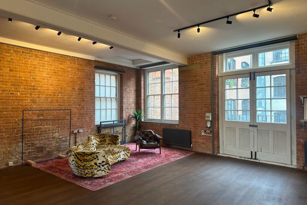 Warehouse venue in London with brick walls and funky furniture